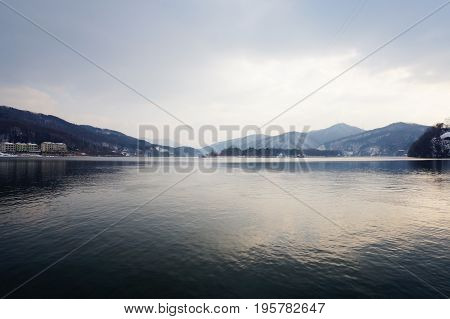 Beautiful lake view with the mountain landscape and cloudy sky