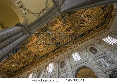 Basilica di San Giovanni in Laterano (St. John Lateran basilica). The ceiling with gold details. Italy Rome June 2017