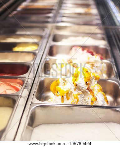 Gelateria - Mixed trays of ice cream in ice-cream shop close up