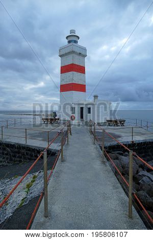 White Lighthouse In Gardur Iin Iceland