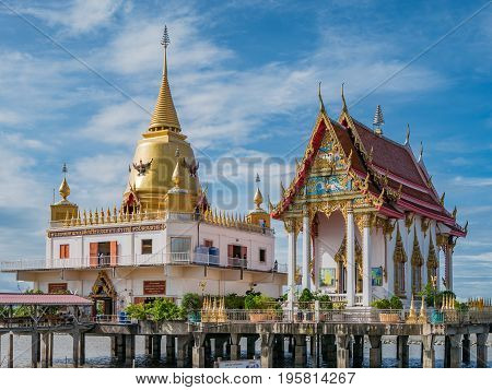 Bang Pakong Thailand - July 16 2017: Wat Hong Thong a temple built on a concrete platform at the coast of Chachoensao in Thailand after the sea started to reclaim the area of the original temple several decades ago as a result of erosion.