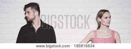Conflicted Couple Standing Far Apart