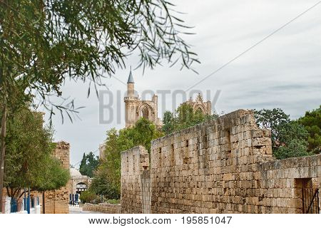 Ancient street to mosque, Gothic St. Nicholas Cathedral in town Famagusta, North Cyprus