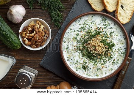 Homemade Chilled Tarator With Ingredients On Wooden Rustic Background.