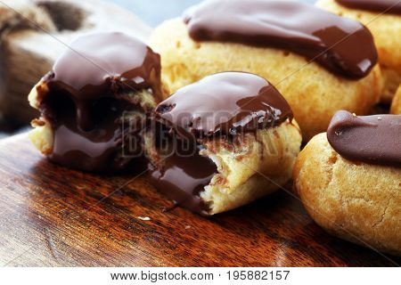 Traditional French Dessert. Eclair With Chocolate Icing. Pastery Concept