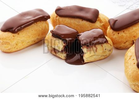 Traditional French Dessert. Eclair With Chocolate Icing. Pastery Concept