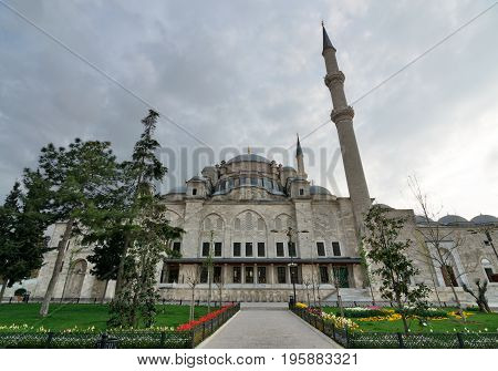 Istanbul, Turkey - April 21, 2017: Exterior low angle shot of Fatih Mosque before dusk. An Ottoman imperial mosque located Fatih district Istanbul Turkey