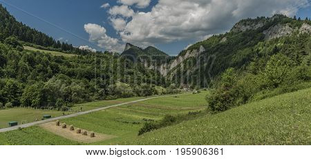 Sokolica hill from Lesnica village in summer sunny day