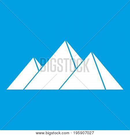 Pyramids in Giza icon white isolated on blue background vector illustration
