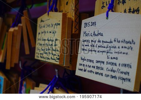 HAKONE, JAPAN - JULY 02, 2017: EMA at Kiyomizu-dera Temple. EMA are small wooden plaques on which Shinto worshippers write their prayers or wishes.