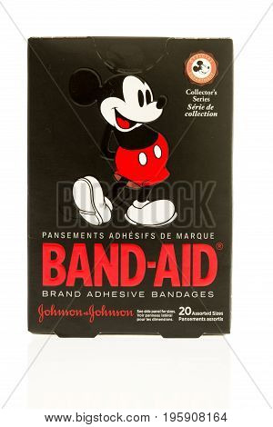 Winneconne WI - 15 July 2017: A box of Band-Aids featuring Mickey Mouse on an isolated background.