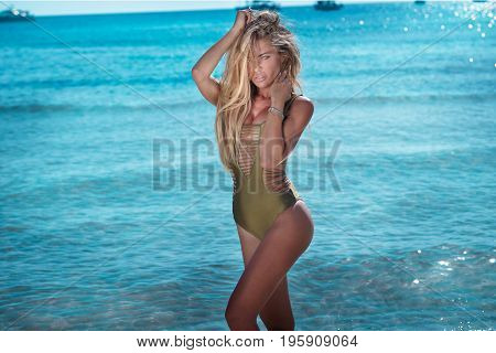 Sexy Blonde Lady On The Beach.