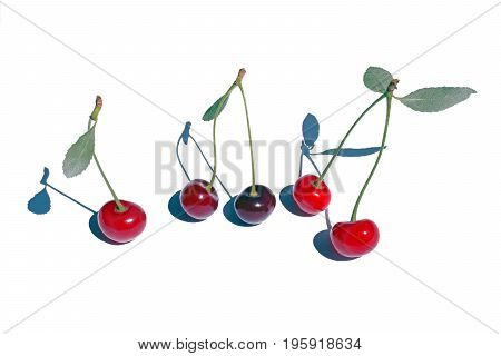 Bright red cherries on a white background