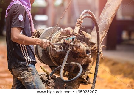 Worker Installing Wet-process Bored Pile For Outside Public Construction