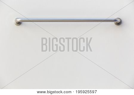 Stainless Steel Towel On Grey Cement Wall In Bathroom