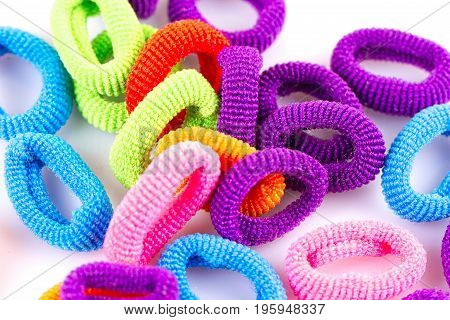 the hair multicolored rubber bands grouped close-up