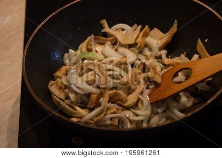 Lactarius piperatus with onion and salted and toasted bread