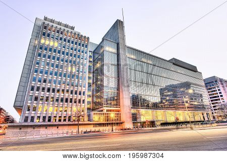 Washington DC USA - March 4 2017: World Bank Group headquarters entrance modern glass building with street during evening sunset