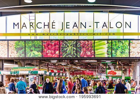 Montreal Canada - May 27 2017: Jean Talon market sign and entrance with people in Little Italy neighborhood in city in Quebec region
