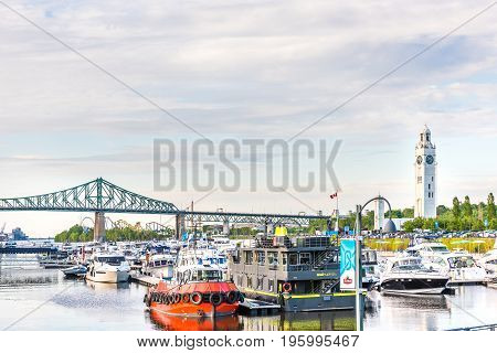 Montreal, Canada - May 27, 2017: Old Port Area With Harbor And Ships, Boats In City In Quebec Region