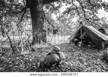 World War Ii German Wehrmacht Infantry Soldier Army Weapon Ammunition. Helmet, Rifles, Tent In Fores