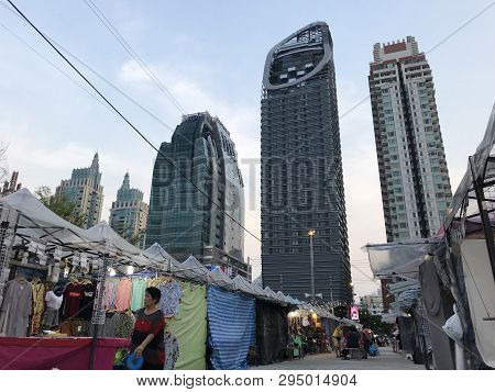 Bangkok, Thailand - April 16, 2018: Old One Story Market Meets Huge Skyscrapers - Concrete Jungle
