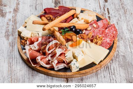 Antipasto Platter Cold Meat With Grissini Bread Sticks, Prosciutto, Slices Ham, Beef Jerky, Salami A