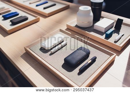 New Design Iqos. Showcase With A Large Multi-colored Selection System Of Heating Of Tobacco. Color D