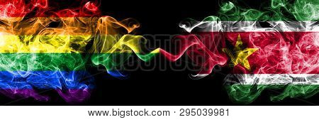 Gay Vs Suriname, Surinamese Smoke Flags Placed Side By Side. Thick Colored Silky Smoke Flags Of Prid
