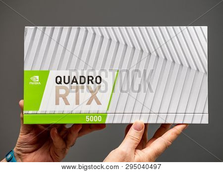 Paris France - Mar 28 2019: Senior Man Showing Cardboard Boxes Before Unboxing Of Nvidia Quadro Rtx 