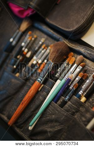 Workplace Make-up Artist Special Brushes To Create An Image And Make-up Leather Case On The Table. M