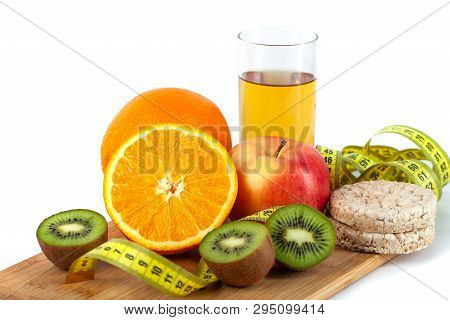 Apple, Orange, Kiwi With Measure Tape On White Background