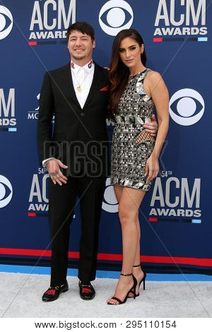 LAS VEGAS - APR 7:  Jon Stone, Brittainy Taylor at the 54th Academy of Country Music Awards at the MGM Grand Garden Arena on April 7, 2019 in Las Vegas, NV