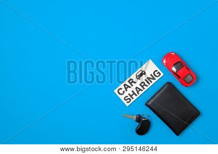 Car Sharing Concept With Toy Car, Auto Drive License, Car Key, Text Sign 