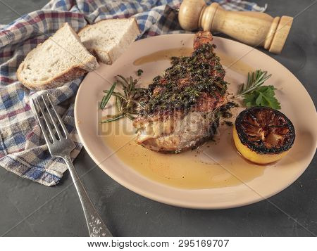 Roasted Sea Bass With Beurre Noir Sauce And Caramelized Lemon