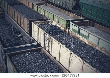 Rail Cars Loaded With Coal, A Train Transports Coal.