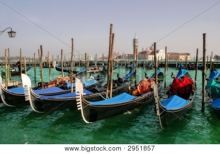 Gondolas on Grand Canal in front of San Giorgio Maggiore church.