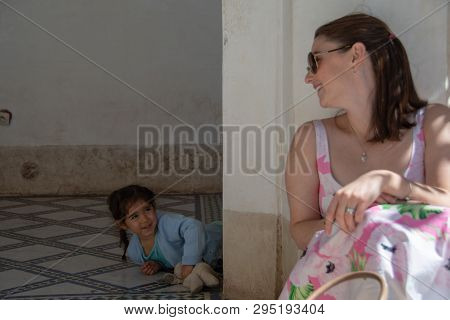 Mother And Daugher Being Playful