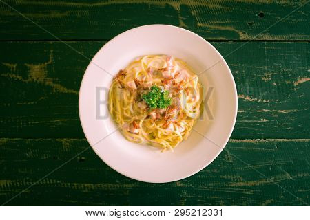 Spaghetti Carbonara With Bacon And Ham And Parsley And Mayonnaise Sauce. Spaghetti Carbonara With Ba