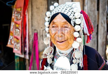 CHIANG RAI, THAILAND- FEBRUARY 2019 : Daily lives of women in a white karen village, a subgroup of the Karen hilltribe in a small village near Chiang Rai, Thailand