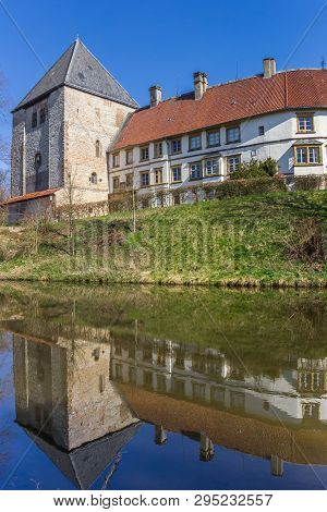 Castle Rheda With Reflection In The Pond In Germany