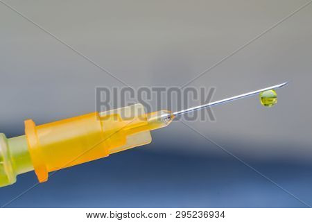 Hypodermic Needle With One Drop Of Drug On His Peak