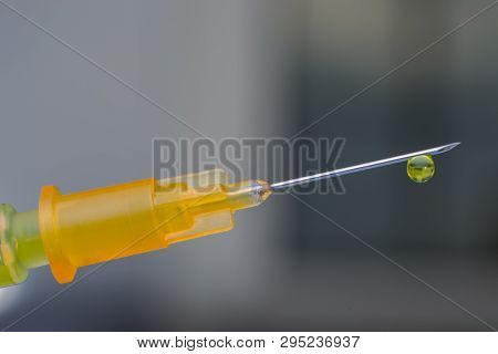 Hypodermic Needle With One Drop Of Drug On His Peak