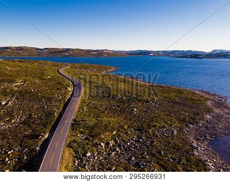 Aerial View. Road Crossing Hardangervidda Plateau, Norway Landscape. National Tourist Hardangervidda