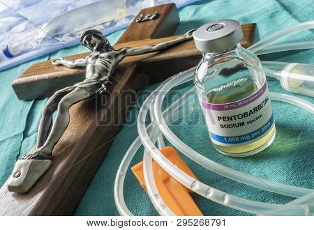 Vial With Doses Of Pentobarbital Next To A Crucifix, Debate Between Life And Death, Religious Belief
