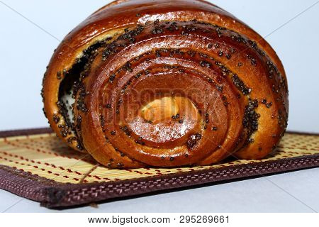 On A Napkin For Food Is Rich Sweet Bun With Poppy Seed Filling