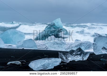 Storm At Diamond Beach Near Jökulsárlón, Filled With Washed Ashore Icebergs
