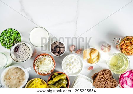 Super Healthy Probiotic Fermented Food Sources, Drinks, Ingredients, On White Marble Background Copy
