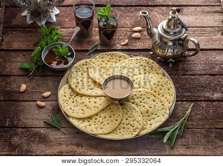 Baghrir With Honey, Almond Sauce And Mint Tea