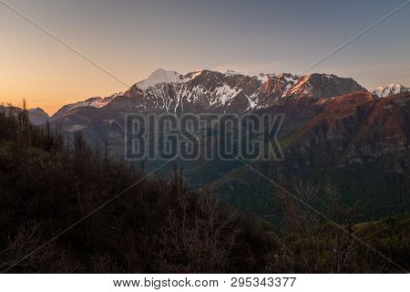 Sunset View From Border Road Of Slovenia And Italy To Mountain Range Krn In Triglav National Park In